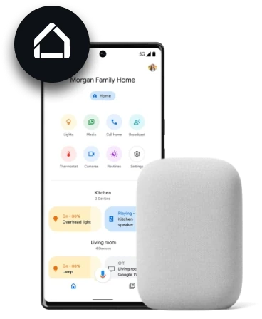 An Android phone showing the Google Home app beside a Google Nest speaker