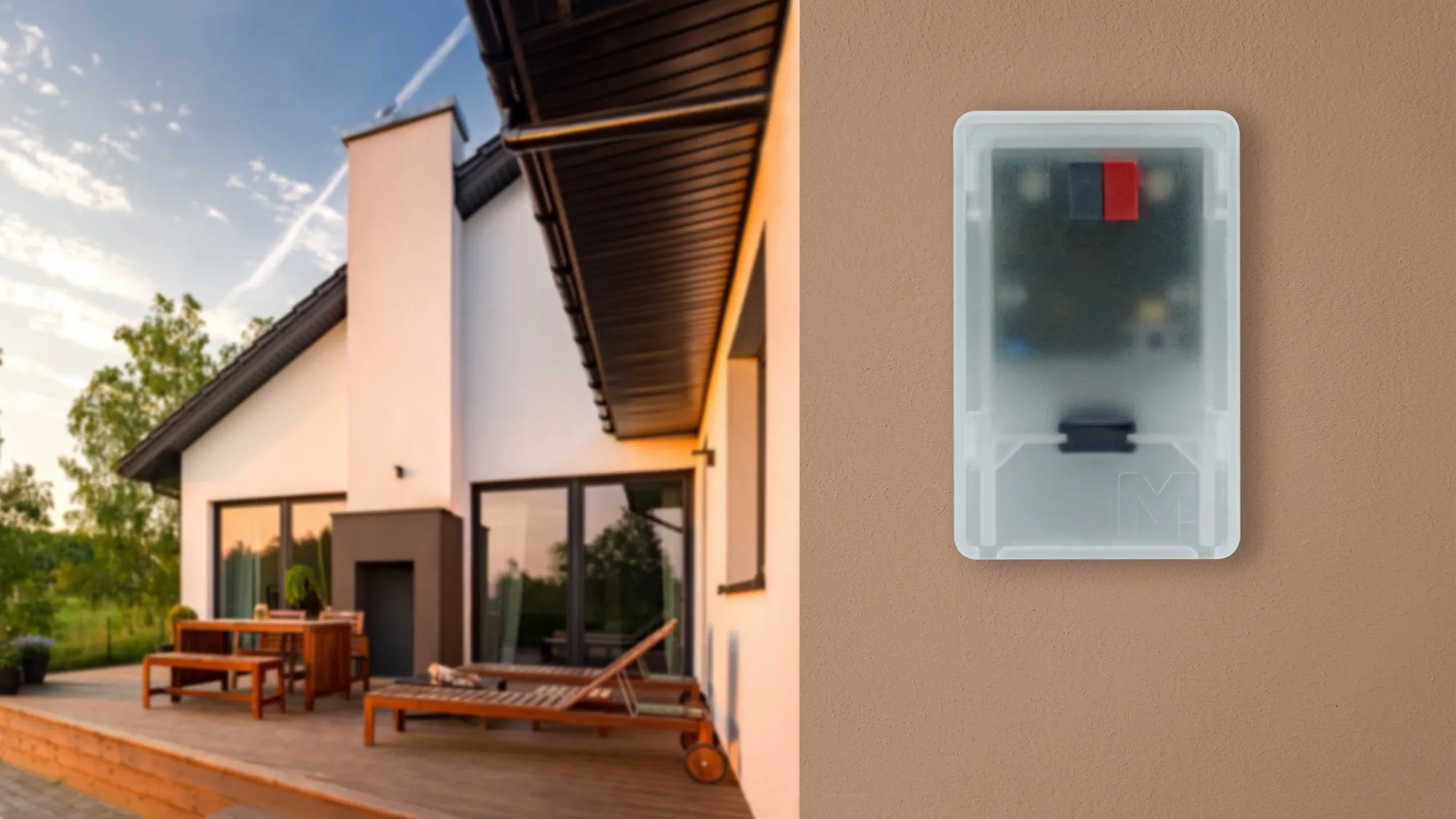 An MDT twilight and temperature sensor on the outside wall of a house